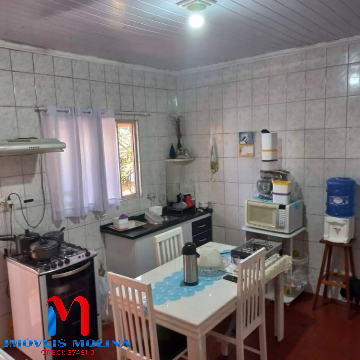 Casa à venda com 2 quartos, 104m² - Foto 1