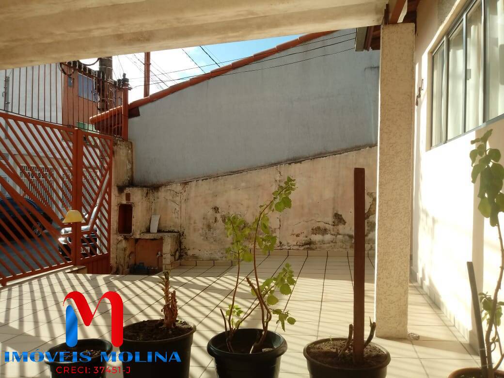 Casa à venda com 4 quartos, 161m² - Foto 2